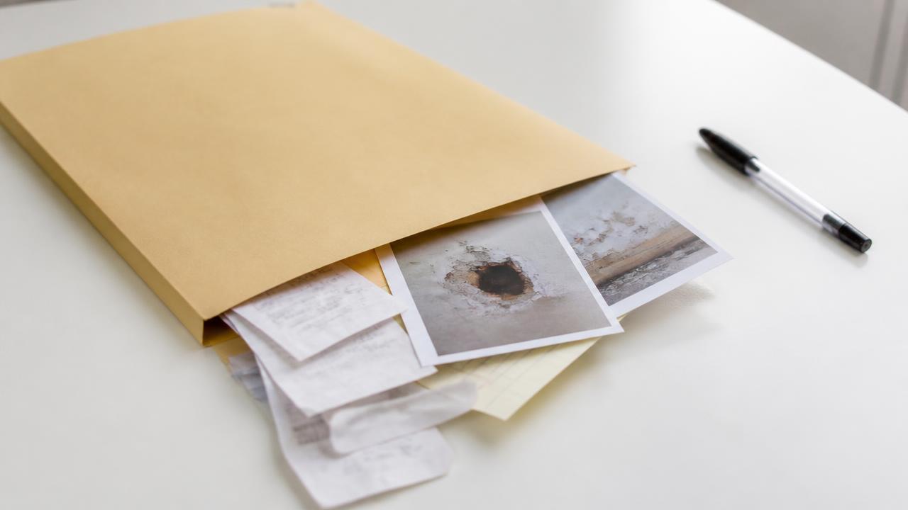 Small claims case documents and evidence organized in folders